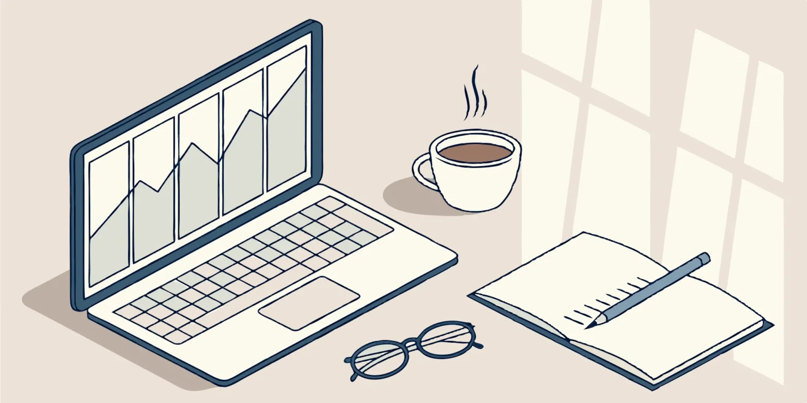 Professional service firm accounting tools: laptop, notebook, coffee.