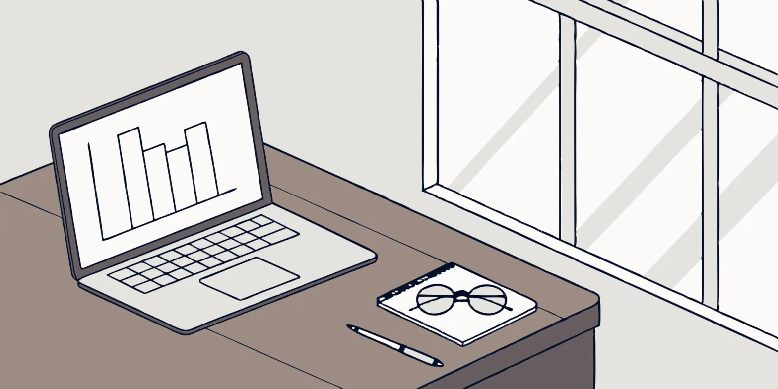 Accounting software training tools: Laptop, notebook, and pen.