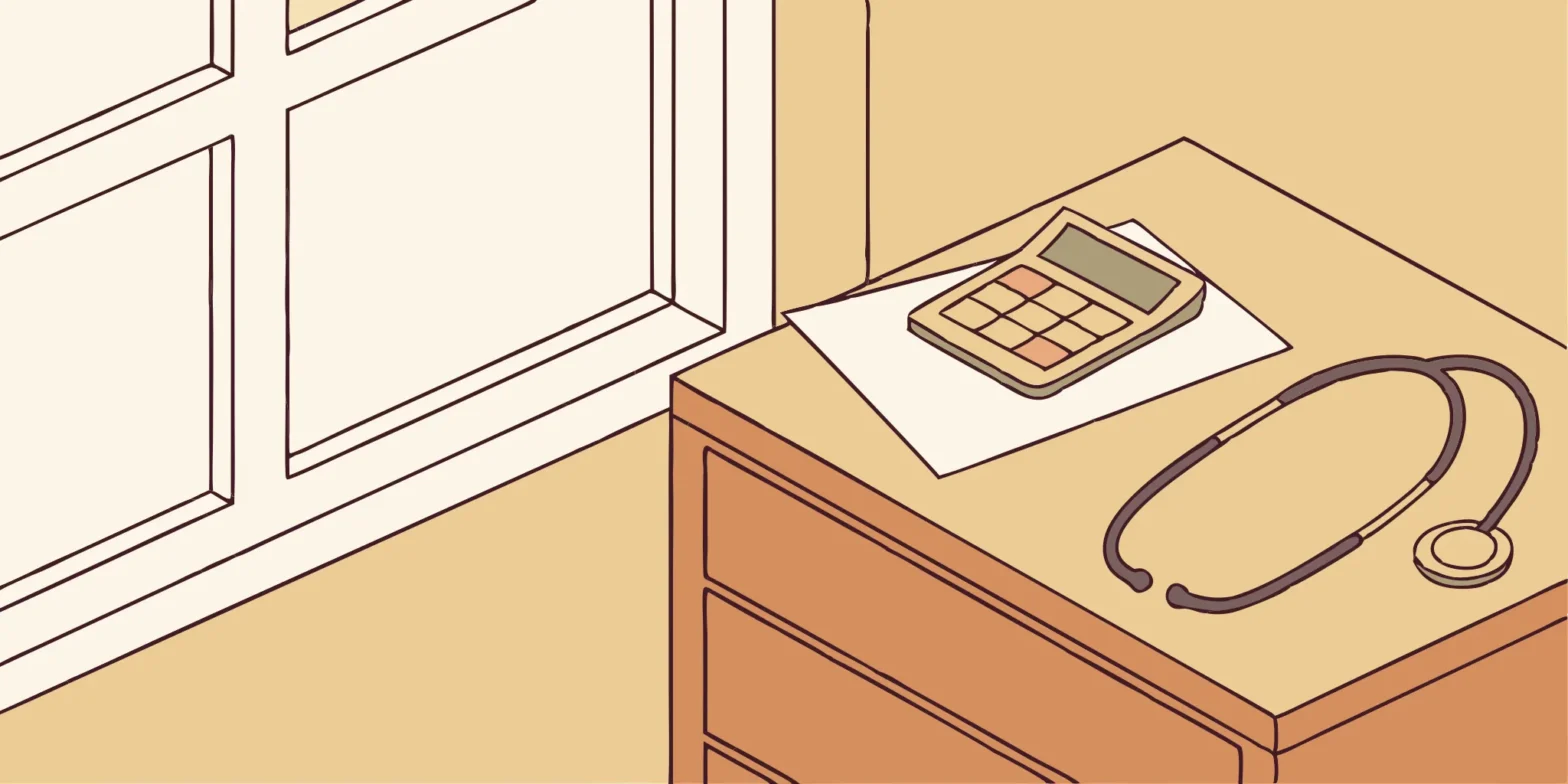 Stethoscope and calculator. Healthcare provider tax deductions under the CARES Act.