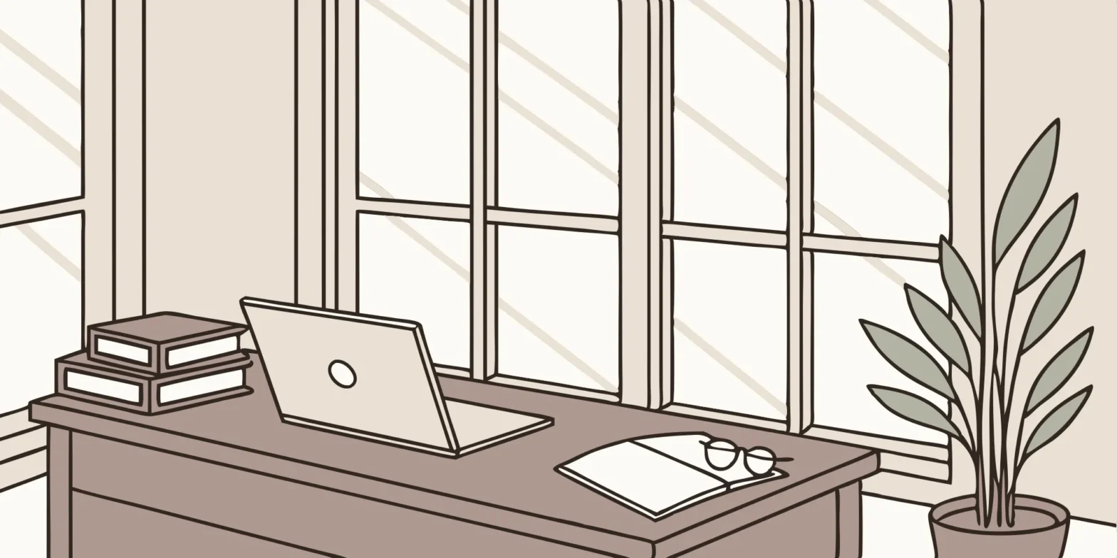 Laptop, law books, and glasses on a desk. Tax deductions for lawyers.