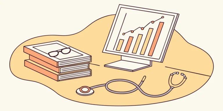 Stethoscope and computer chart on a desk for healthcare audit preparation.