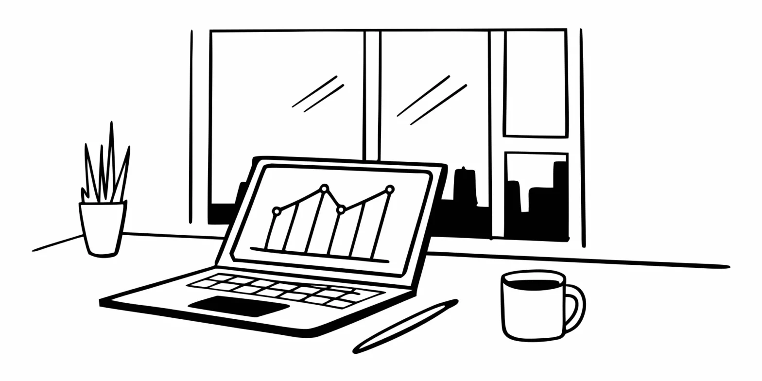 Laptop on a desk showing a graph for cryptocurrency tax consulting services.