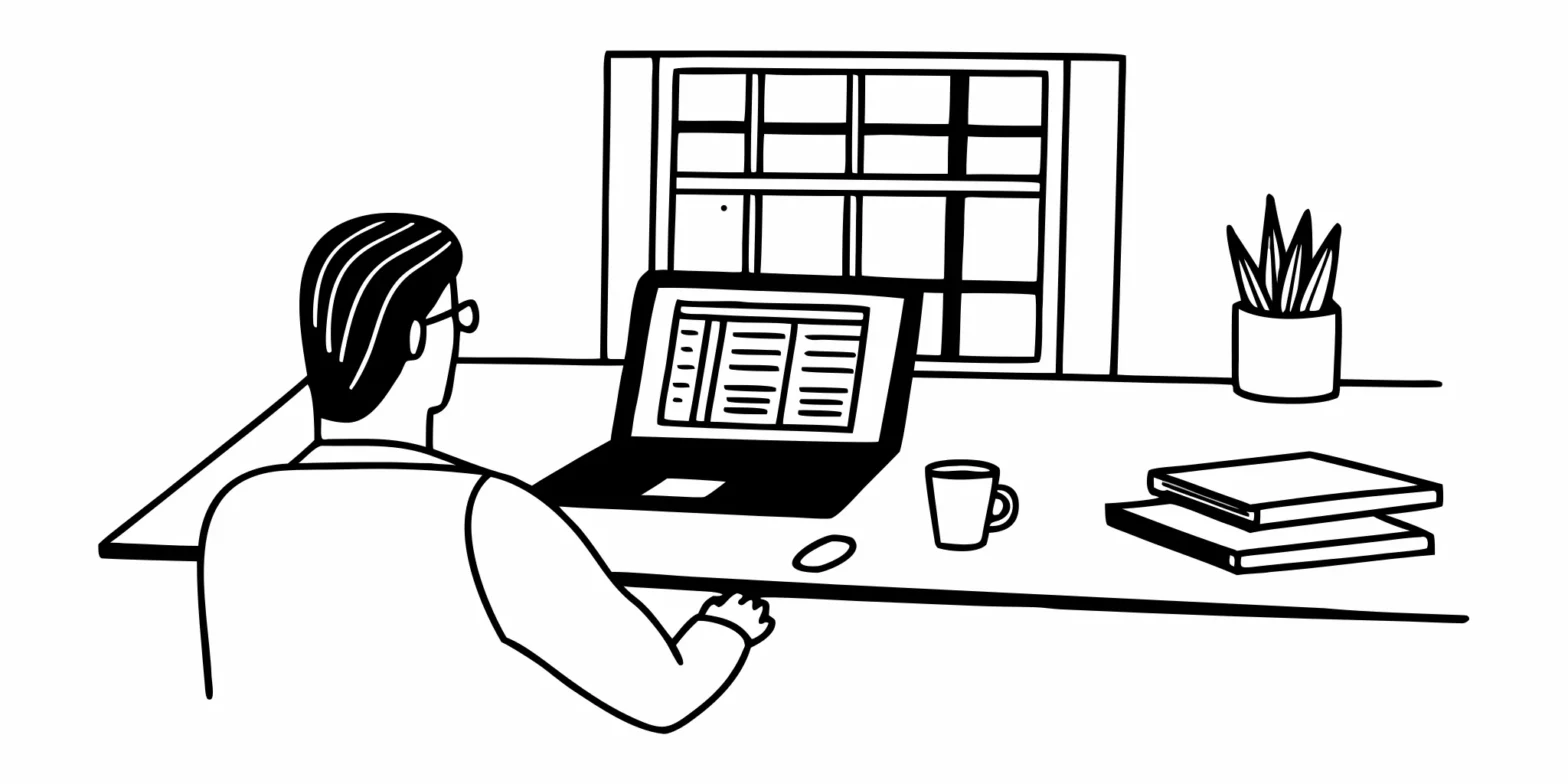 Fintech startup founder using a laptop for tax preparation.