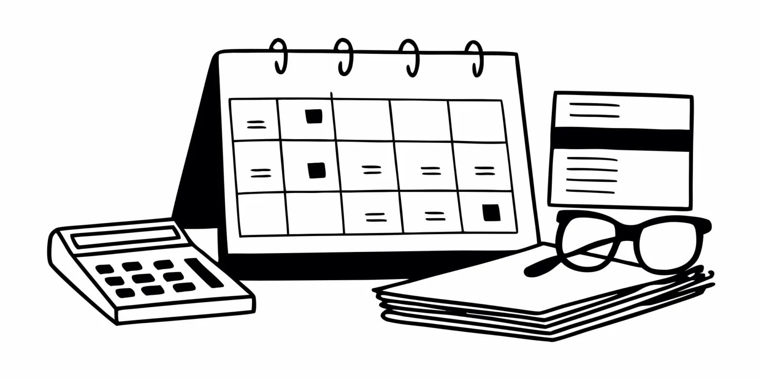 A calendar, calculator, and documents used for the financial benefits of year-round tax planning.