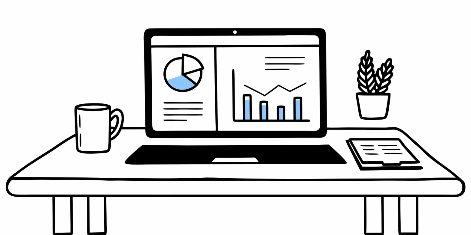 Laptop showing the FreshBooks dashboard with financial charts for a small business software review.