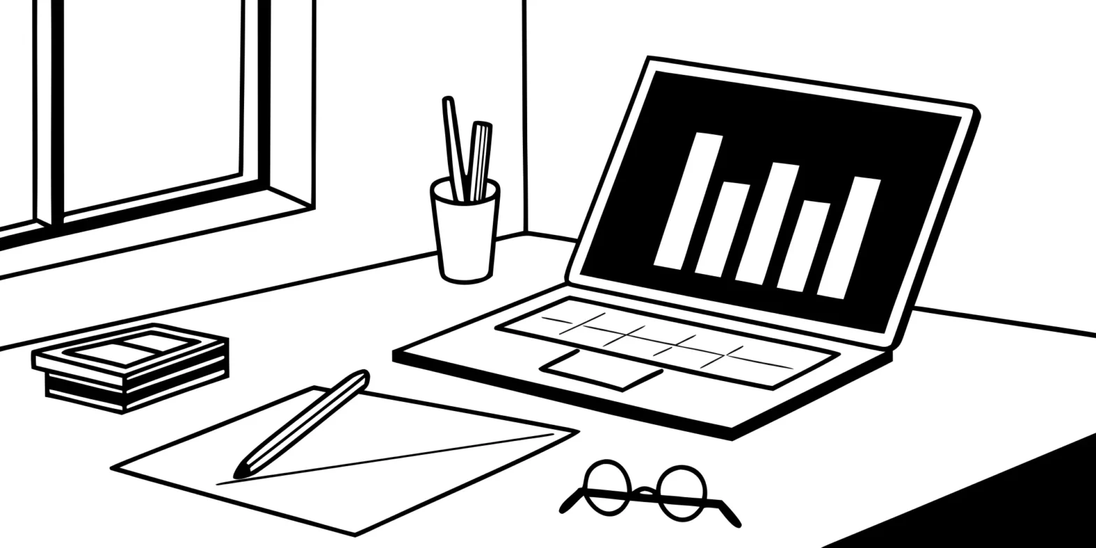Laptop on a desk showing a financial chart for managing rental property tax deductions.