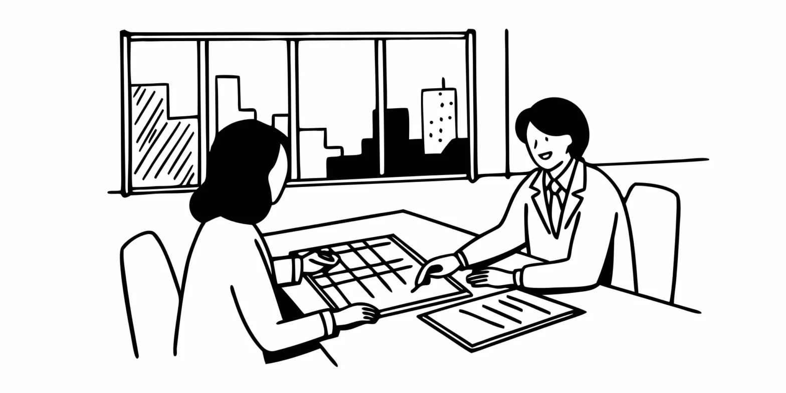California CPA tax advisor reviewing stock option documents with a physician client in a modern office